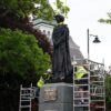 Thatcher statue lowered into place despite egg throwing threats